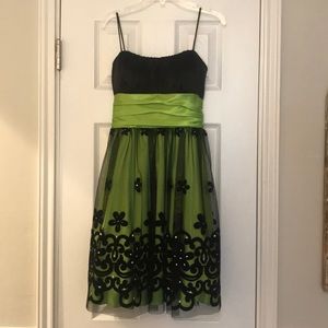 Green and black party dress